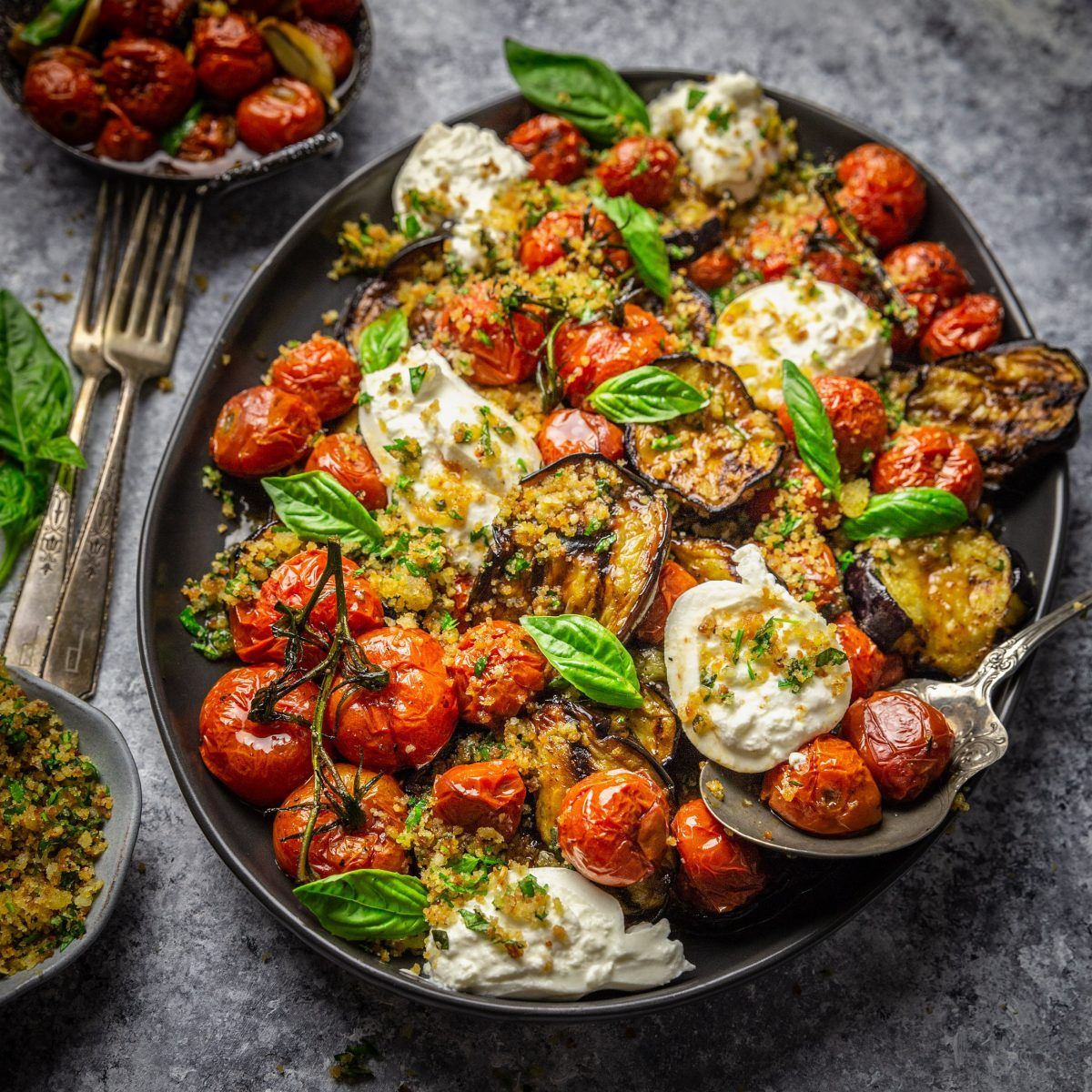 GRILLED EGGPLANT PARMESAN WITH ROASTED TOMATOES, BURRATA, AND GARLIC HERB BREADCRUMBS